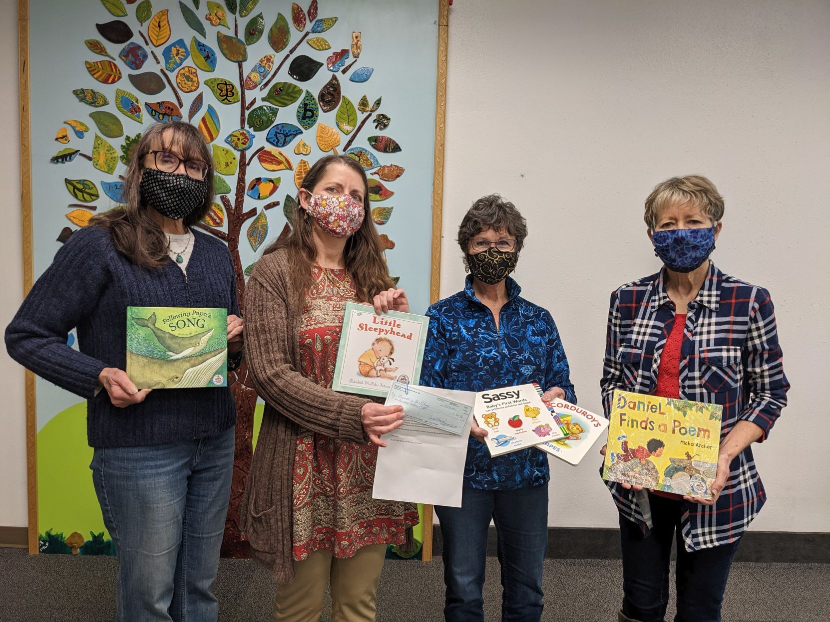 Quota donates to Friends of the Library